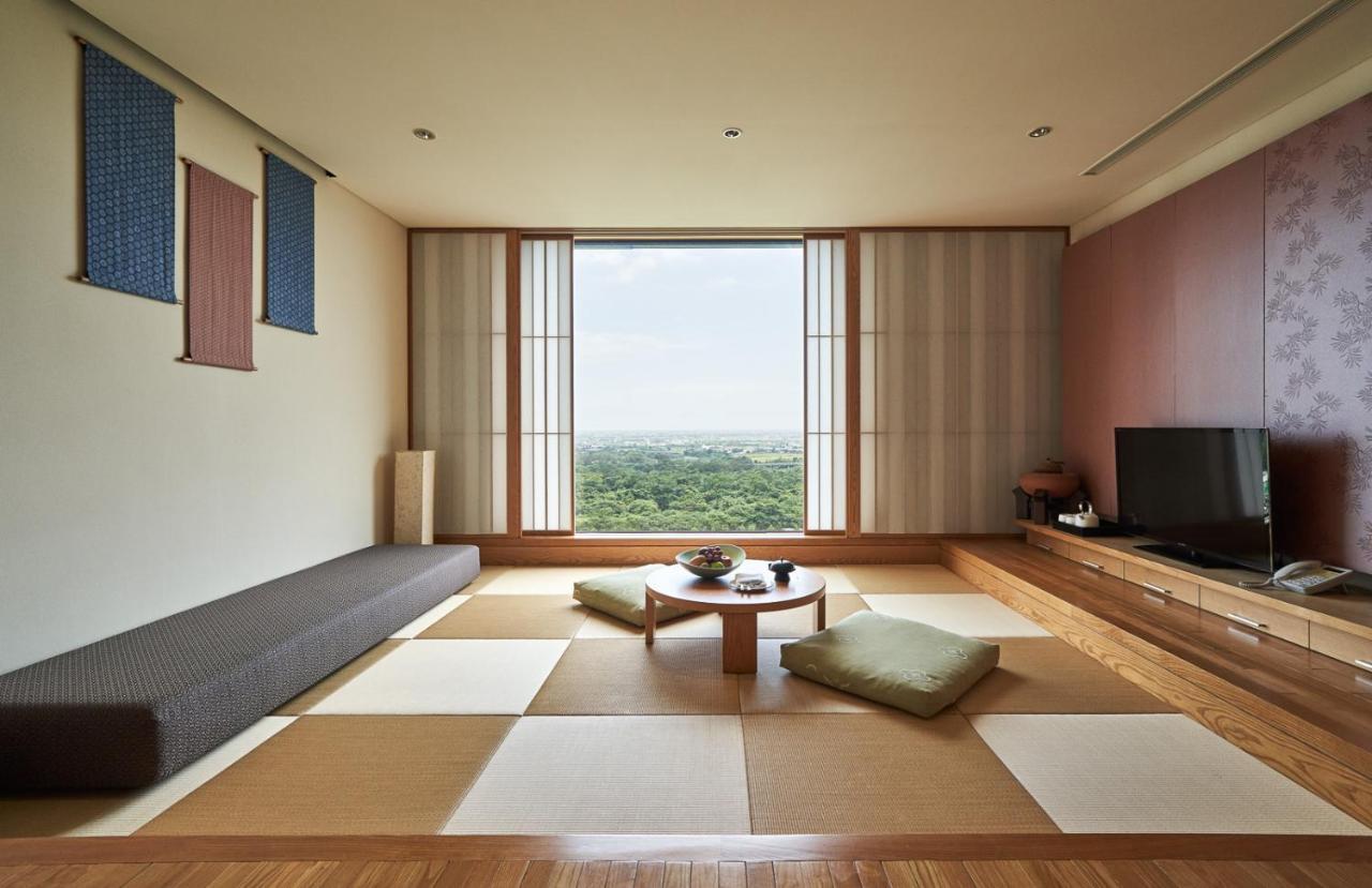 Hotel Royal Chiao Hsi Csiaohszi Kültér fotó A tatami room at the hotel